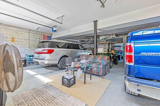 HUGE direct entry, two car garage beneath the home - don't forget about the elevator!!! | Image 25