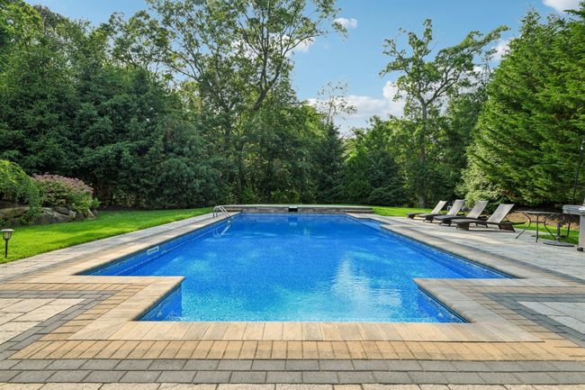 Swimming pool with a Designer Styled Paver PatioHeated and Salt Water | Image 46