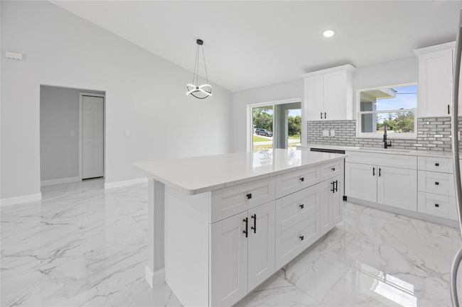 kitchen dining and back covered porch | Image 26