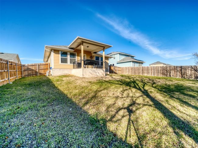 Back of house with a yard | Image 21