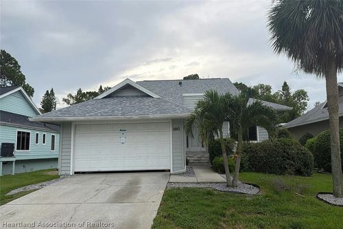 1003 Lake Avoca Dr, TARPON SPRINGS, FL, 34689-7108 | Card Image