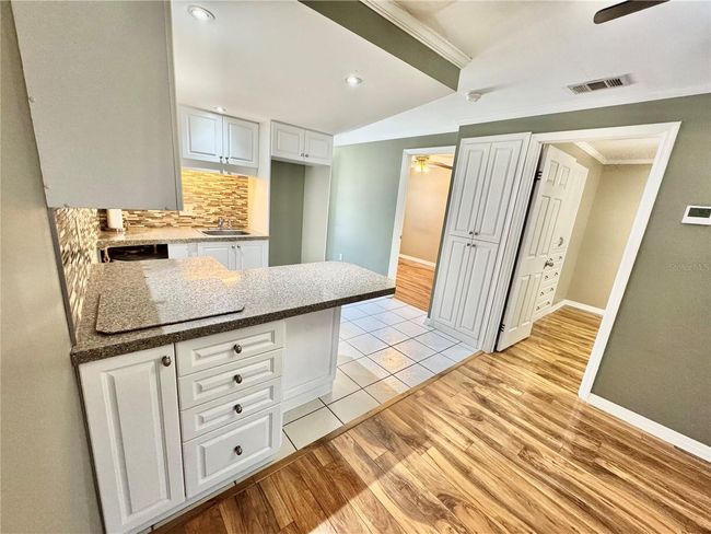 View from dinette to kitchen and bedrooms | Image 11