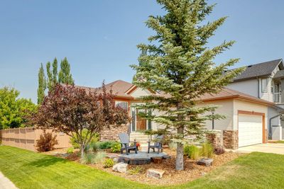 124 Cimarron Park Cir, House detached with 4 bedrooms, 2 bathrooms and 4 parking in Okotoks AB | Image 1