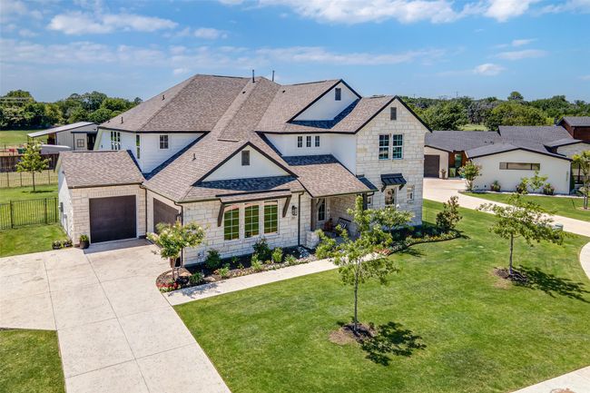 2 car garage and separate 1 car garage as well as additional driveway parking space. | Image 36