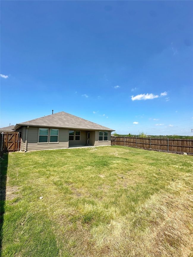 View of yard with a fenced backyard | Image 27