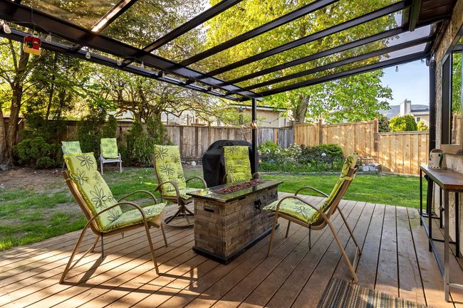 Covered patio with direct access to the kitchen - great for barbecuing | Image 27