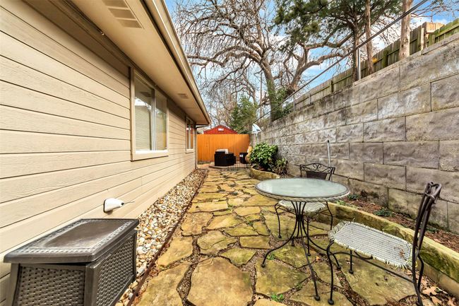 Fenced backyard featuring a patio area | Image 32
