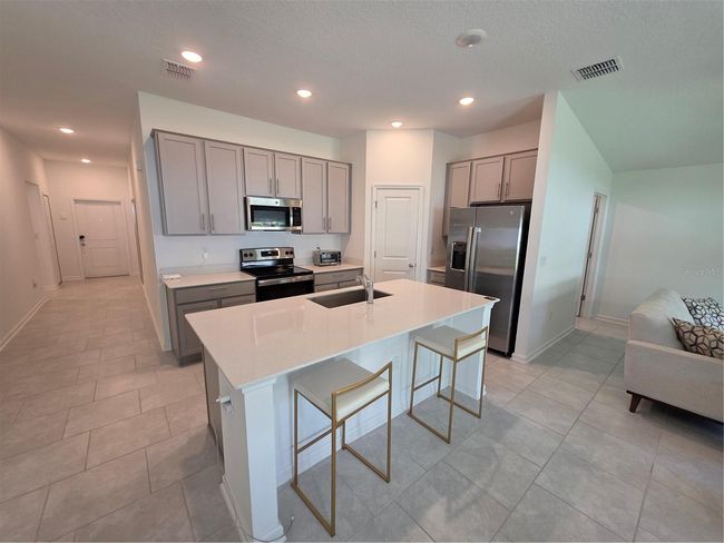 1216 Peach Creek Dr, House other with 3 bedrooms, 2 bathrooms and null parking in OSTEEN FL | Image 4