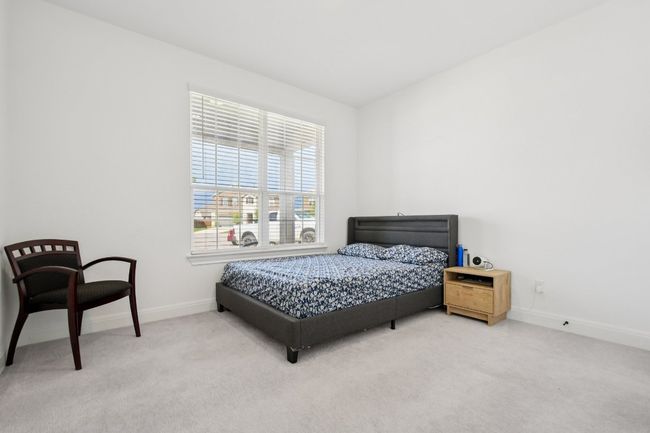 Bedroom with carpet | Image 12