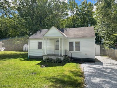 Bungalow featuring a front yard | Image 1