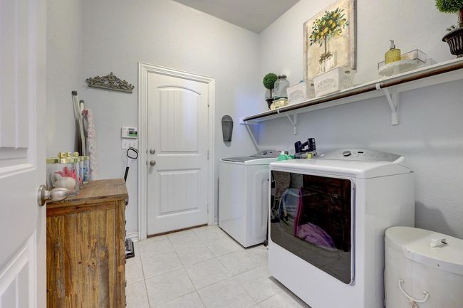 422 Betony Loop, House other with 3 bedrooms, 3 bathrooms and 2 parking in Buda TX | Image 32