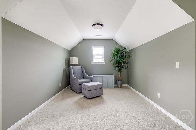 Extra sitting area in the master suite. | Image 28