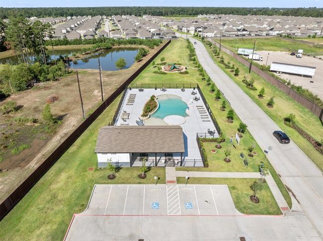 Relax on a hot day at the pool walking distance to the home | Image 31