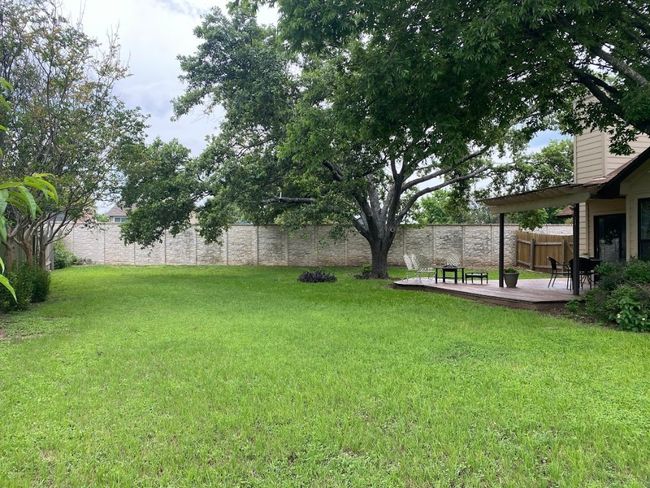 Backyard with lovely covered deck and lots of room! | Image 12