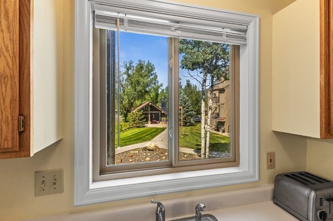 Kitchen window with view of the Hot Tub area | Image 12