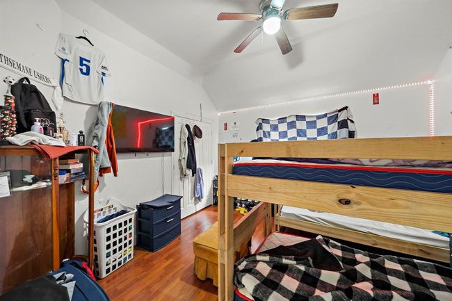 Generously sized and well-lit, each secondary bedroom supports comfortable living with plenty of room for desks, beds, and storage. Vaulted ceilings and clean lines enhance the overall spaciousness and architectural appeal. | Image 25
