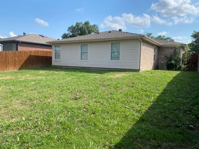 Back of house featuring brick siding | Image 5