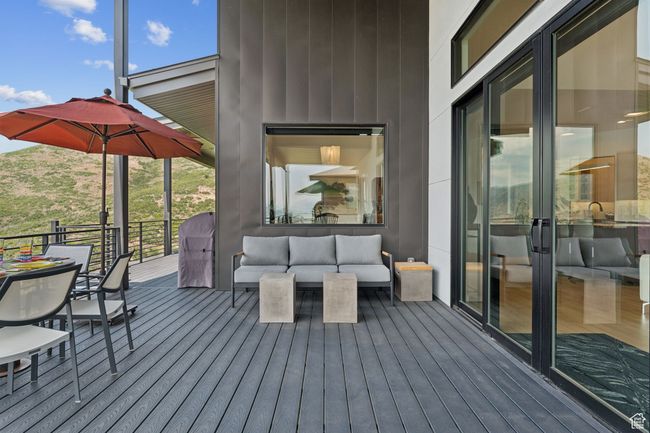 Wooden terrace with outdoor lounge area | Image 45
