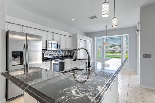 e34-1725 Morning Sun Ln, NAPLES, FL, 34119-3318 | Card Image