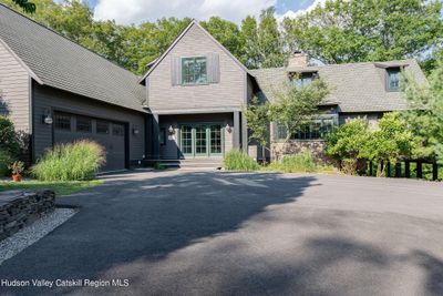 Architecture with shed roof dormers designed by Meyer Davis | Image 1