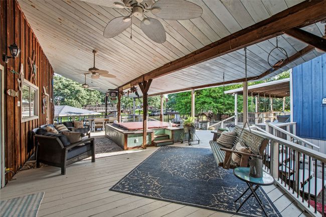 Main house deck with 8 person hot tub | Image 21