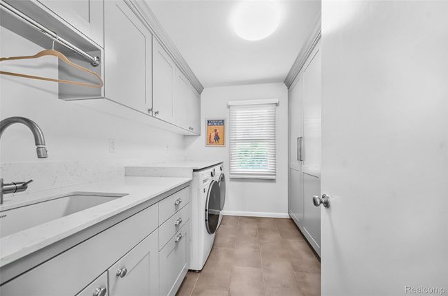 First Level Laundry with Abundance of Storage | Image 27
