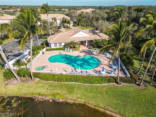 View of pool with a patio and a yard | Image 39