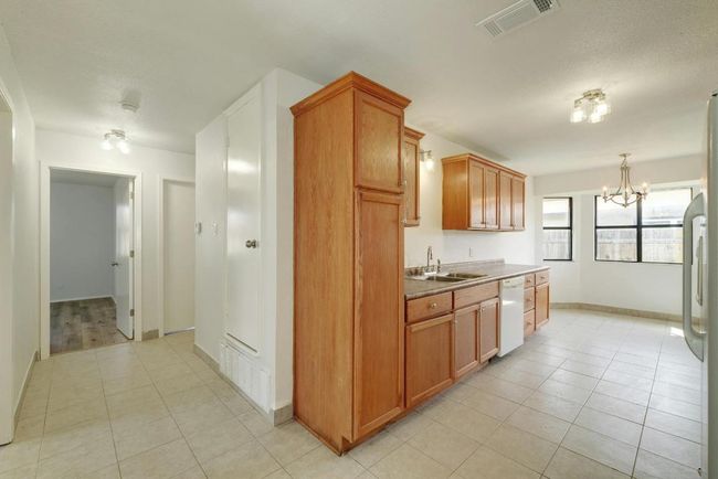 Dining Area Look to Hallway and to Kitchen | Image 9