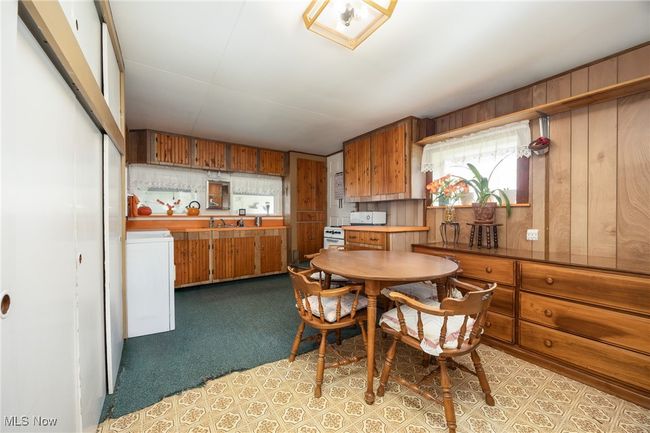 2nd Kitchen/Dining space featuring washer / clothes dryer | Image 24