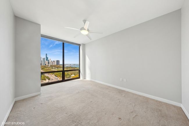 Master bedroom with lake view | Image 9