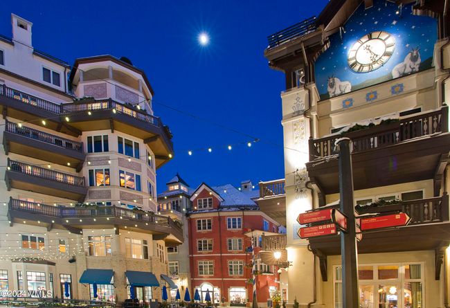 Experience the romance of Vail Square under the stars—this is the view just steps from Penthouse #642. Twinkling lights, alpine charm, and storybook architecture set the scene for unforgettable nights at the base of the mountain. | Image 23