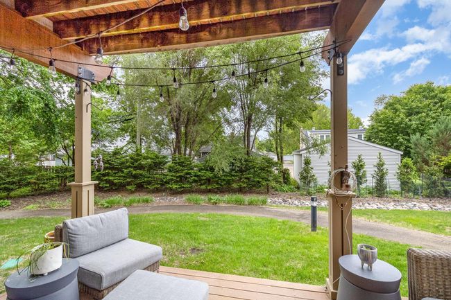 Extend your living space into the beautiful outdoors on this main level condo surrounded by nature. | Image 8