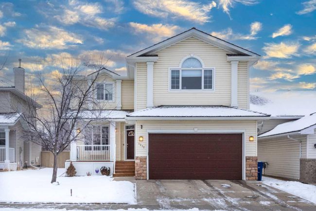 1212 Woodside Way Nw, Home with 4 bedrooms, 2 bathrooms and 4 parking in Airdrie AB | Image 1