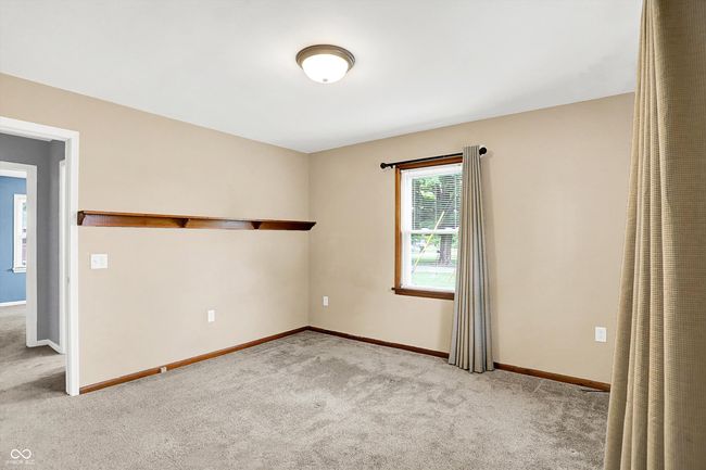unfurnished room featuring carpet floors and baseboards | Image 16
