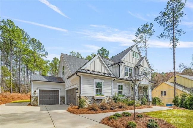 3-car garage with additional parking space available in the driveway | Image 29
