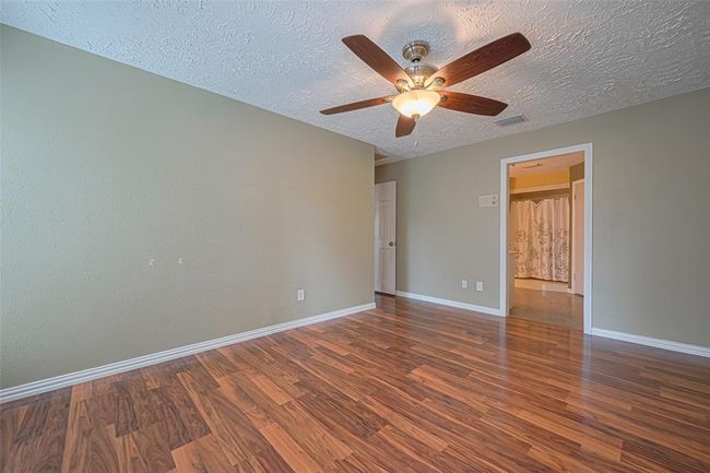 View to the bathroom from primary bedroom | Image 17