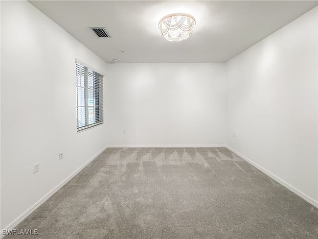 Unfurnished room with carpet flooring and baseboards | Image 23