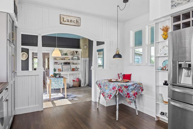 Dining area with dark wood-style floors | Image 13