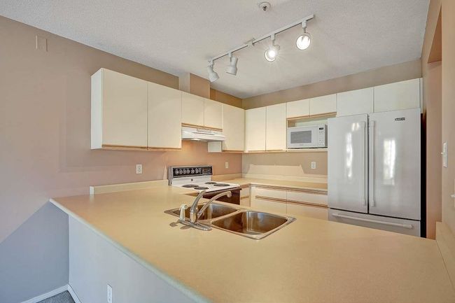 418 - 1219 Johnson Street, Condo with 2 bedrooms, 1 bathrooms and 1 parking in Coquitlam BC | Image 19