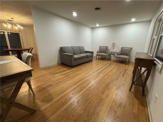 Spacious great room. Gorgeous floors. Coat closet. Abundance of light. | Image 12