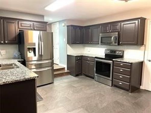 1214 Broken Arrow Trl, Carrollton, TX, 75007-6232 | Card Image