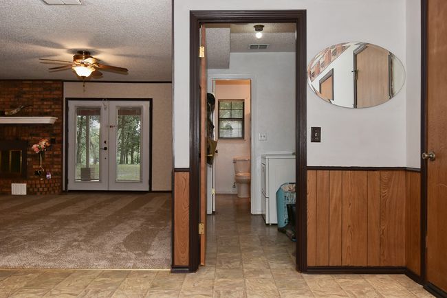 3/4 bath, laundry, next to living area and dining. | Image 29