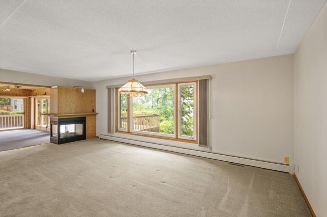 Living room w/2 sided fireplace | Image 12