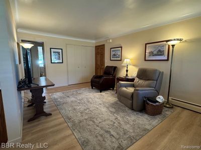 View of living room from the dining area | Image 3