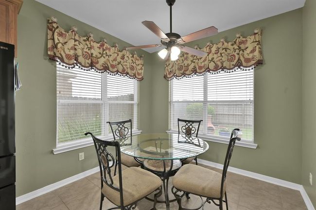 Breakfast area overlooking the backyard. | Image 15