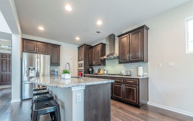 Another view of the kitchen. | Image 7