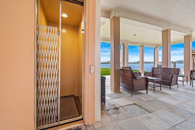 The home features a convenient elevator, providing easy access to all three levels | Image 40