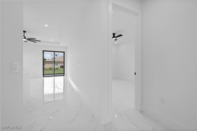 Detailed view of ceiling fan, baseboards, and recessed lighting | Image 20
