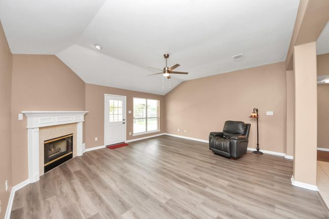 Cozy Living room in the cold months and well ventilated with a new fan in the summer time. | Image 24
