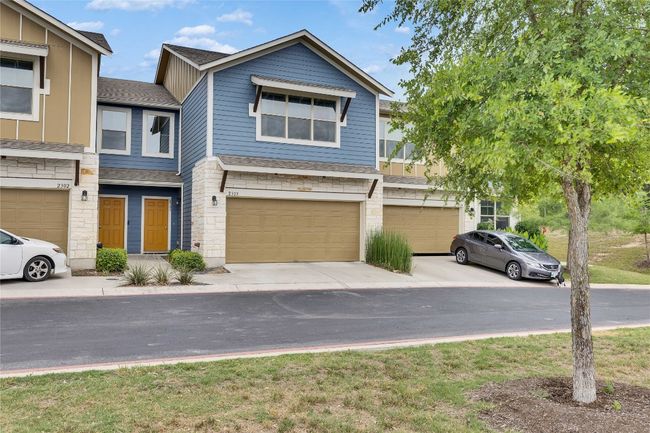 The condo comes with a full 2 car garage. | Image 19